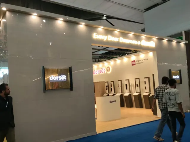 Dorset digital locks exhibition booth with stone-finish walls and product plinths