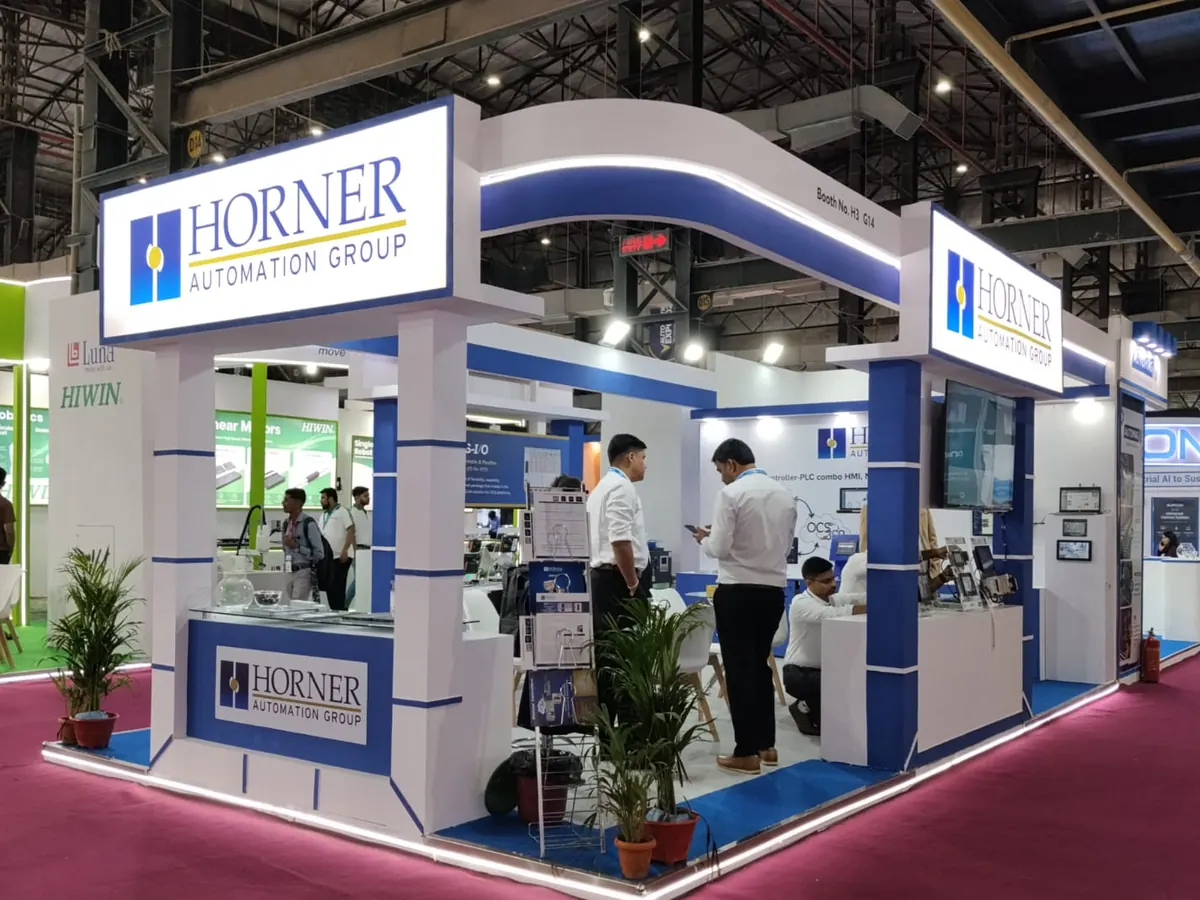 Horner Automation Group corner exhibition booth with illuminated fascia and demo counters